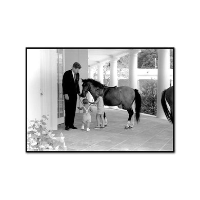 President Kennedy Visits with his Children, John F. Kennedy Jr. and Caroline Kennedy, and Pony Macaroni, White House, West Wing Colonnade